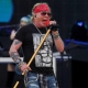 Axl Rose on stage with mic