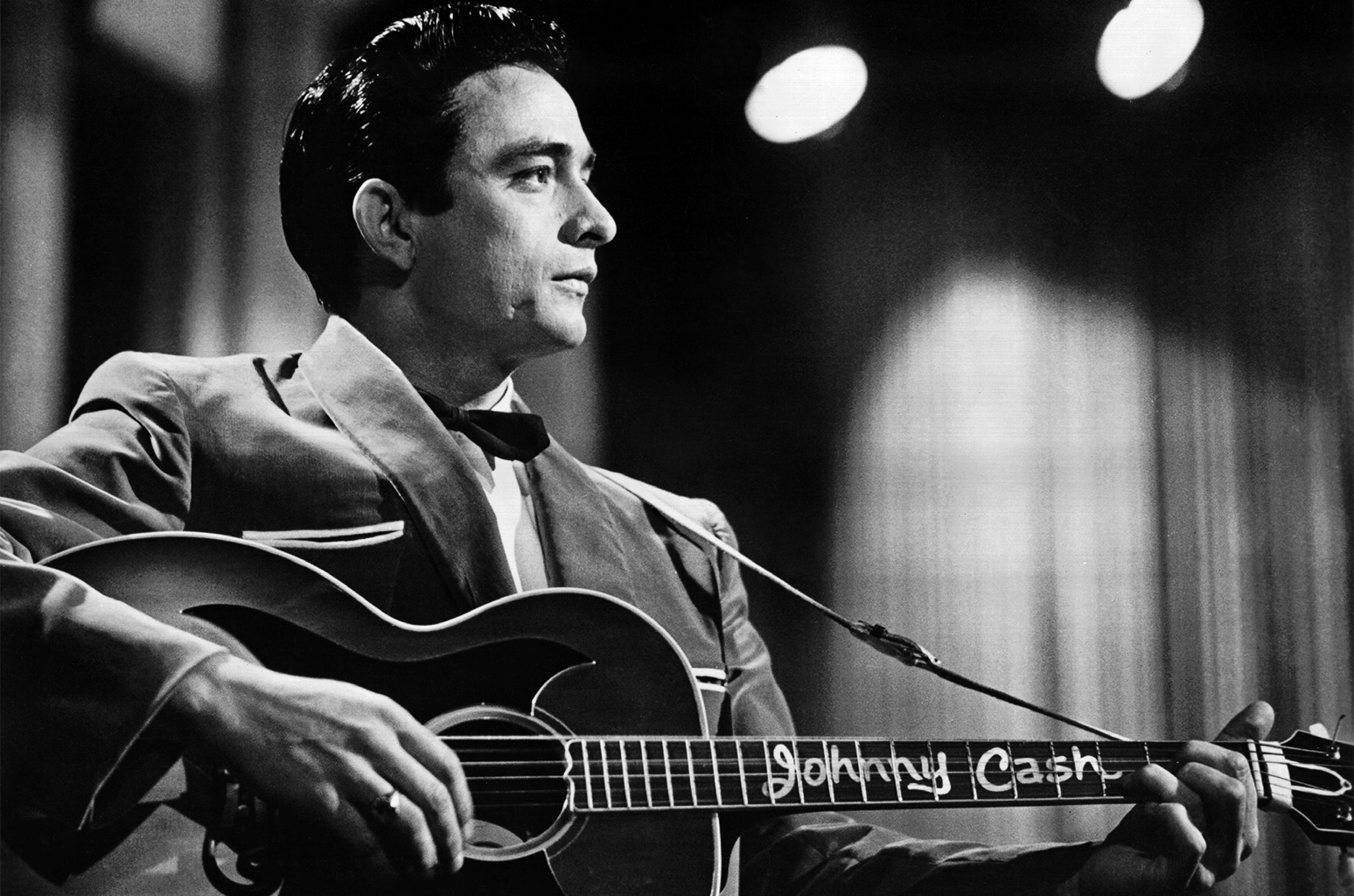 Johnny Cash playing Guitar