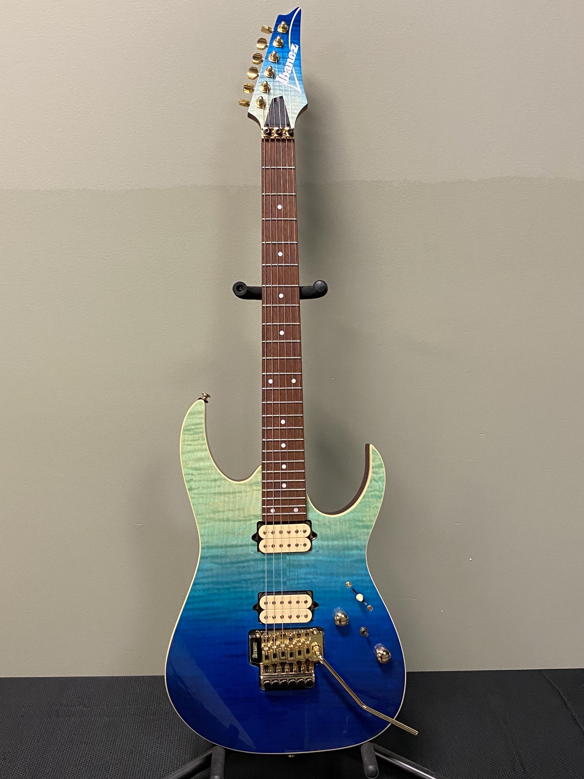 Ibanez light blue to dark blue guitar