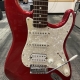 closeup of red electric guitar