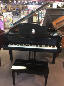 black samick grand piano with bench