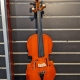 1/2 size brown violin on black slat wall