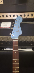 Used Fender Ventera Jazzmaster Ice Blue Metallic closeup of neck and front of headstock.